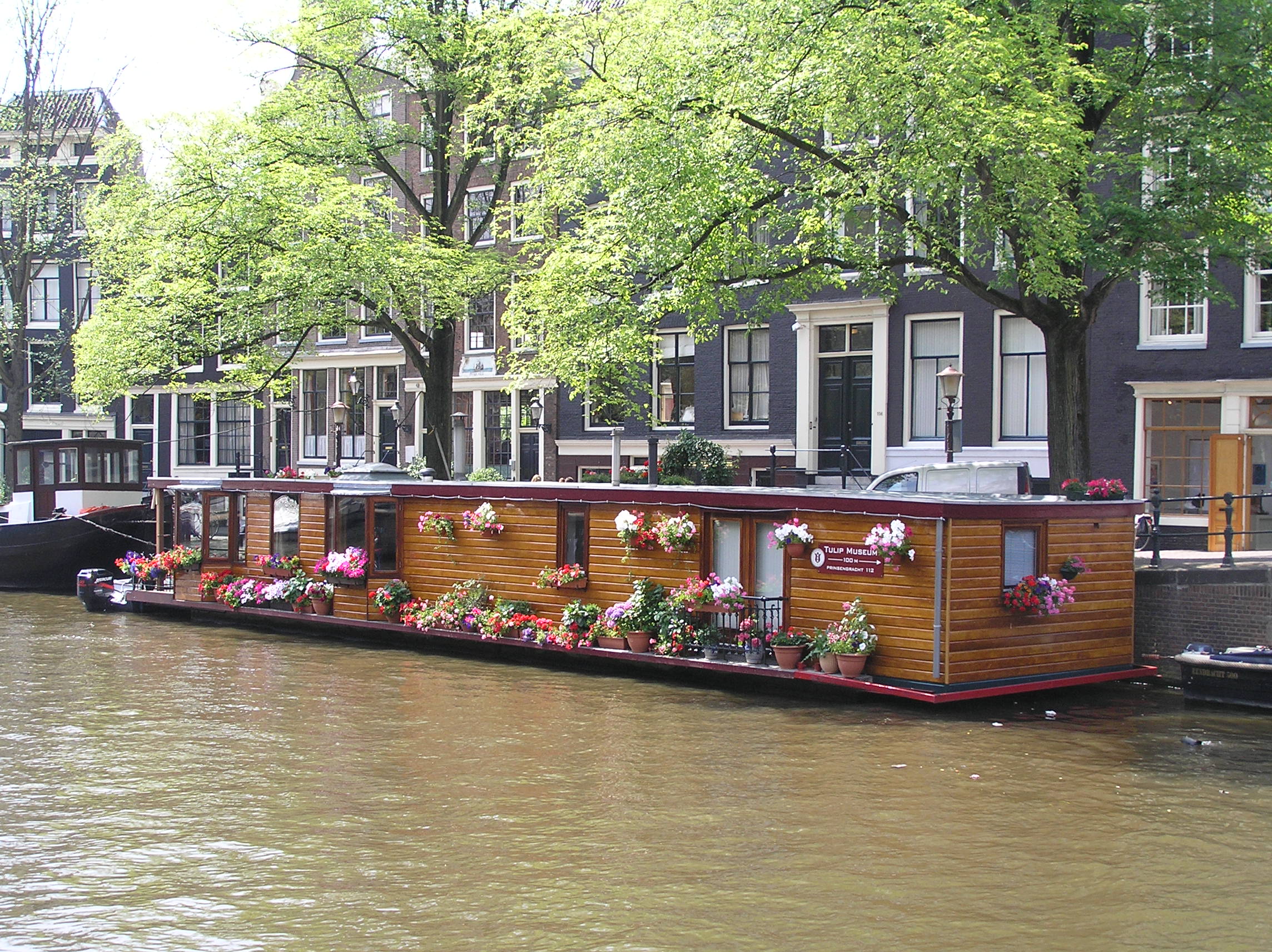 houseboat canal amsterdam netherlands holland
